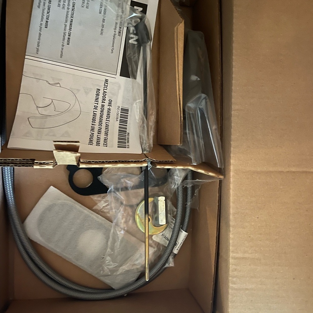Moen single hole lavatory faucet. Matte black finish. Quantity of 2.
